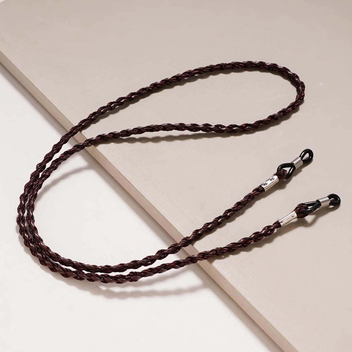 attache lunette femme marron