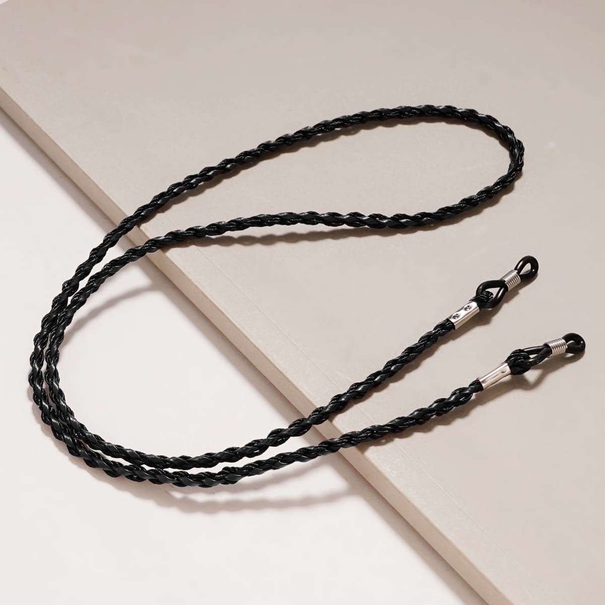 attache lunette femme noir