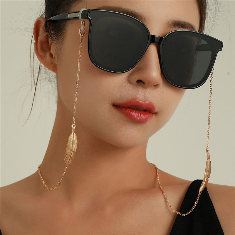 chaine collier lunettes plume
