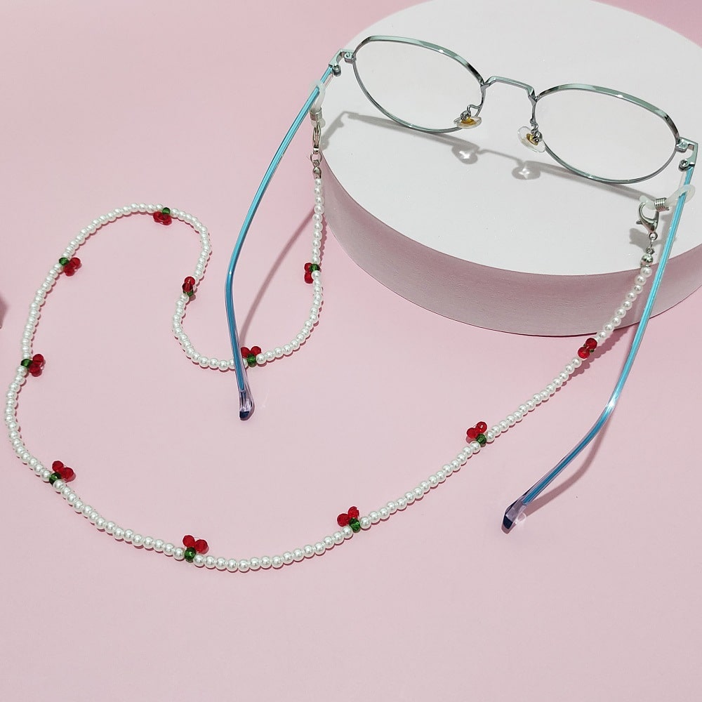 collier pour lunettes de vue cerise perles blanches
