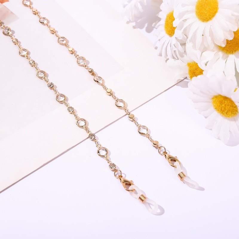 porte lunette collier pierres transparentes